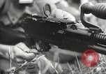 Image of Japanese infantry prepare for battle Bataan Luzon Philippines, 1942, second 55 stock footage video 65675062389