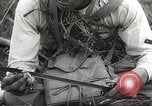Image of Japanese infantry prepare for battle Bataan Luzon Philippines, 1942, second 58 stock footage video 65675062389