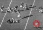 Image of football match Los Angeles California USA, 1955, second 8 stock footage video 65675062514