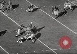 Image of football match Los Angeles California USA, 1955, second 18 stock footage video 65675062514