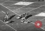 Image of football match Los Angeles California USA, 1955, second 20 stock footage video 65675062514