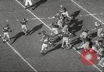Image of football match Los Angeles California USA, 1955, second 28 stock footage video 65675062514