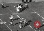 Image of football match Los Angeles California USA, 1955, second 30 stock footage video 65675062514