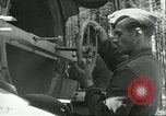 Standbild deutsche Techniker arbeiten an V-2 Rakete Antrieb Blizna Polen, 1944, aus Sekunde 41 historischem Filmmaterial Videoclip 65675062554