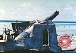 Image of Japanese coastal defense gun Tarawa Gilbert Islands, 1944, second 3 stock footage video 65675062569