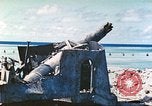 Image of Japanese coastal defense gun Tarawa Gilbert Islands, 1944, second 5 stock footage video 65675062569