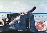 Image of Japanese coastal defense gun Tarawa Gilbert Islands, 1944, second 7 stock footage video 65675062569