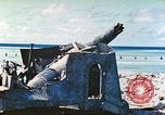 Image of Japanese coastal defense gun Tarawa Gilbert Islands, 1944, second 8 stock footage video 65675062569