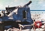 Image of Japanese coastal defense gun Tarawa Gilbert Islands, 1944, second 15 stock footage video 65675062569