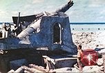Image of Japanese coastal defense gun Tarawa Gilbert Islands, 1944, second 16 stock footage video 65675062569