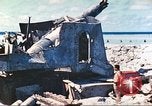 Image of Japanese coastal defense gun Tarawa Gilbert Islands, 1944, second 18 stock footage video 65675062569