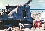 Image of Japanese coastal defense gun Tarawa Gilbert Islands, 1944, second 19 stock footage video 65675062569