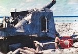 Image of Japanese coastal defense gun Tarawa Gilbert Islands, 1944, second 21 stock footage video 65675062569
