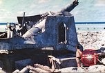 Image of Japanese coastal defense gun Tarawa Gilbert Islands, 1944, second 22 stock footage video 65675062569