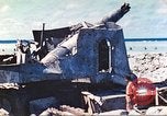 Image of Japanese coastal defense gun Tarawa Gilbert Islands, 1944, second 23 stock footage video 65675062569