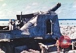 Image of Japanese coastal defense gun Tarawa Gilbert Islands, 1944, second 24 stock footage video 65675062569