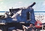 Image of Japanese coastal defense gun Tarawa Gilbert Islands, 1944, second 25 stock footage video 65675062569