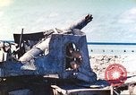 Image of Japanese coastal defense gun Tarawa Gilbert Islands, 1944, second 29 stock footage video 65675062569