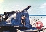 Image of Japanese coastal defense gun Tarawa Gilbert Islands, 1944, second 31 stock footage video 65675062569