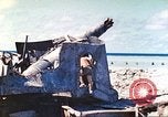 Image of Japanese coastal defense gun Tarawa Gilbert Islands, 1944, second 32 stock footage video 65675062569