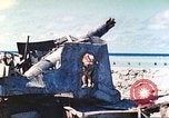 Image of Japanese coastal defense gun Tarawa Gilbert Islands, 1944, second 33 stock footage video 65675062569