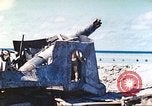 Image of Japanese coastal defense gun Tarawa Gilbert Islands, 1944, second 35 stock footage video 65675062569