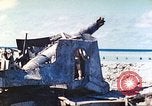 Image of Japanese coastal defense gun Tarawa Gilbert Islands, 1944, second 36 stock footage video 65675062569