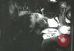 Image of German submarine U-564 reloads torpedo at sea Atlantic Ocean, 1942, second 6 stock footage video 65675062706