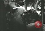 Image of German submarine U-564 reloads torpedo at sea Atlantic Ocean, 1942, second 7 stock footage video 65675062706