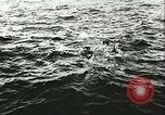 Image of German submarine U-564 reloads torpedo at sea Atlantic Ocean, 1942, second 18 stock footage video 65675062706