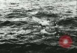 Image of German submarine U-564 reloads torpedo at sea Atlantic Ocean, 1942, second 19 stock footage video 65675062706