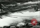 Image of German submarine U-564 reloads torpedo at sea Atlantic Ocean, 1942, second 20 stock footage video 65675062706