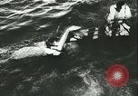 Image of German submarine U-564 reloads torpedo at sea Atlantic Ocean, 1942, second 22 stock footage video 65675062706