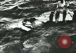 Image of German submarine U-564 reloads torpedo at sea Atlantic Ocean, 1942, second 23 stock footage video 65675062706