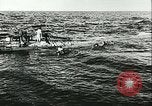 Image of German submarine U-564 reloads torpedo at sea Atlantic Ocean, 1942, second 24 stock footage video 65675062706