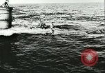 Image of German submarine U-564 reloads torpedo at sea Atlantic Ocean, 1942, second 28 stock footage video 65675062706