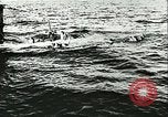 Image of German submarine U-564 reloads torpedo at sea Atlantic Ocean, 1942, second 30 stock footage video 65675062706