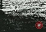 Image of German submarine U-564 reloads torpedo at sea Atlantic Ocean, 1942, second 31 stock footage video 65675062706