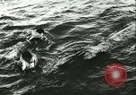 Image of German submarine U-564 reloads torpedo at sea Atlantic Ocean, 1942, second 33 stock footage video 65675062706