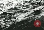 Image of German submarine U-564 reloads torpedo at sea Atlantic Ocean, 1942, second 34 stock footage video 65675062706