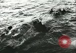 Image of German submarine U-564 reloads torpedo at sea Atlantic Ocean, 1942, second 35 stock footage video 65675062706