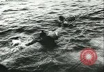 Image of German submarine U-564 reloads torpedo at sea Atlantic Ocean, 1942, second 36 stock footage video 65675062706