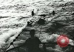 Image of German submarine U-564 reloads torpedo at sea Atlantic Ocean, 1942, second 38 stock footage video 65675062706