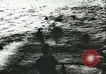 Image of German submarine U-564 reloads torpedo at sea Atlantic Ocean, 1942, second 39 stock footage video 65675062706