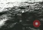 Image of German submarine U-564 reloads torpedo at sea Atlantic Ocean, 1942, second 40 stock footage video 65675062706