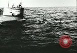 Image of German submarine U-564 reloads torpedo at sea Atlantic Ocean, 1942, second 43 stock footage video 65675062706
