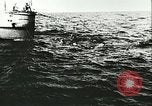 Image of German submarine U-564 reloads torpedo at sea Atlantic Ocean, 1942, second 44 stock footage video 65675062706