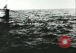 Image of German submarine U-564 reloads torpedo at sea Atlantic Ocean, 1942, second 46 stock footage video 65675062706