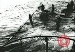 Image of German submarine U-564 reloads torpedo at sea Atlantic Ocean, 1942, second 47 stock footage video 65675062706