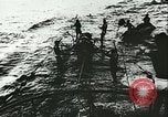 Image of German submarine U-564 reloads torpedo at sea Atlantic Ocean, 1942, second 49 stock footage video 65675062706